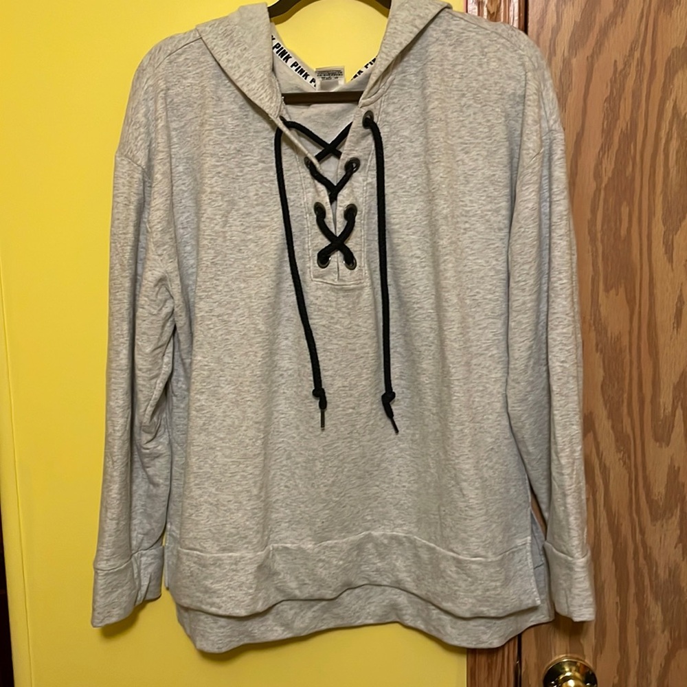Pink corded v-neck hoodie.